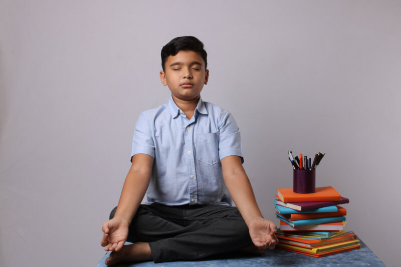 Students Meditating For The Exams