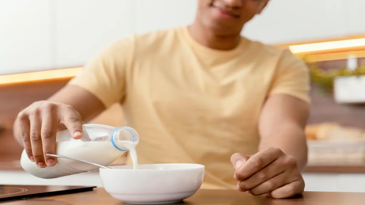 portrait-man-home-pouring-milk-bowl_Activ Living Community