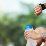 sportsman-checking-smartwatch-outdoors f_Activ Living Community