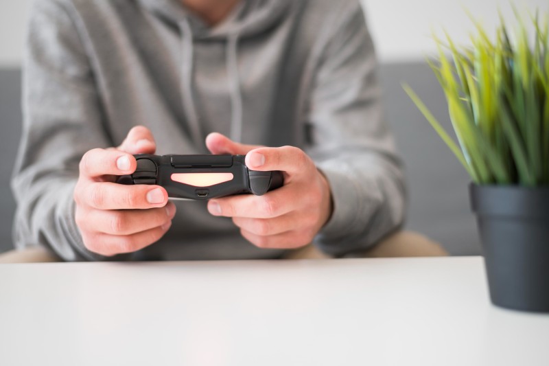 front-view-man-playing-video-games (1)_Activ Living Community