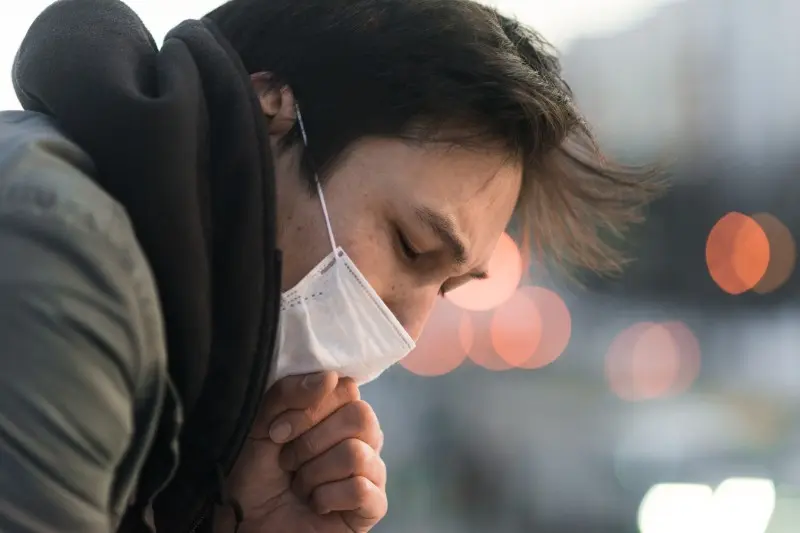 side-view-man-with-mask-coughing (1)_Activ Living Community