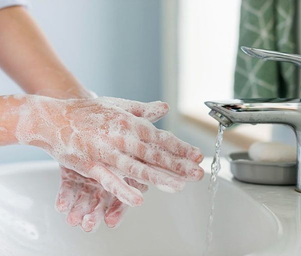 side-view-person-washing-hands-sink (1)_Activ Living Community