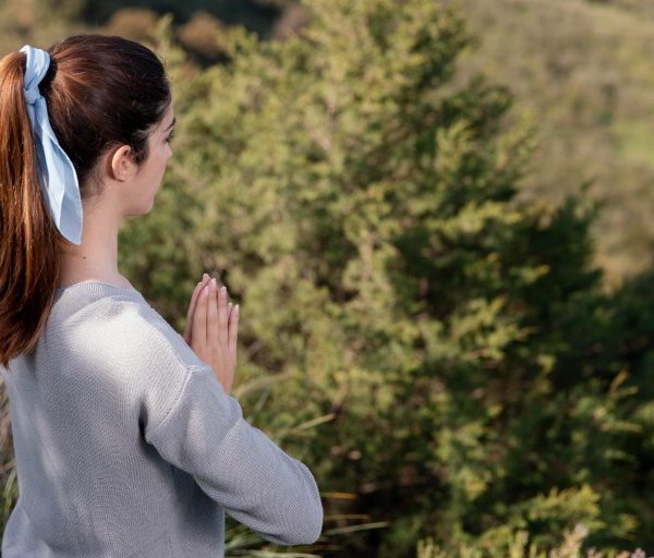 side-view-woman-meditating-nature (1)_Activ Living Community
