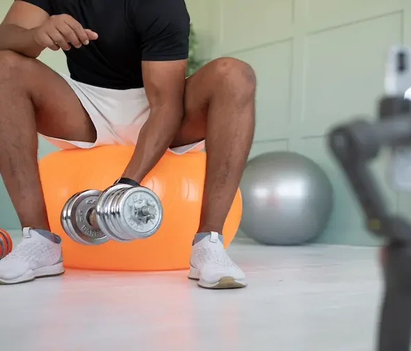 close-up-man-training-with-dumbbell_Activ Living Community