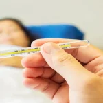 doctor-is-looking-thermometer-measuring-body-temperature-his-patient_Activ Living Community