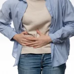 front-view-patient-experiencing-abdominal-pain_Activ Living Community