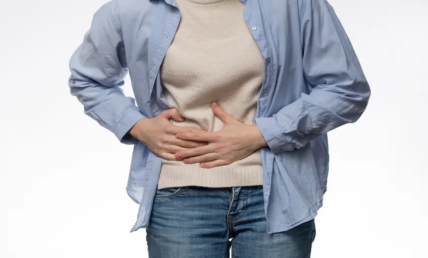 front-view-patient-experiencing-abdominal-pain_Activ Living Community
