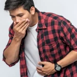 man-standing-with-stomachache-put-your-hands-your-stomach-cover-your-mouth_Activ Living Community
