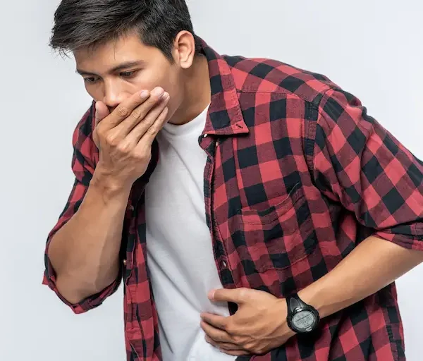 man-standing-with-stomachache-put-your-hands-your-stomach-cover-your-mouth_Activ Living Community
