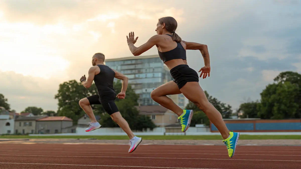 man-woman-running-track-side-view_Activ Living Community