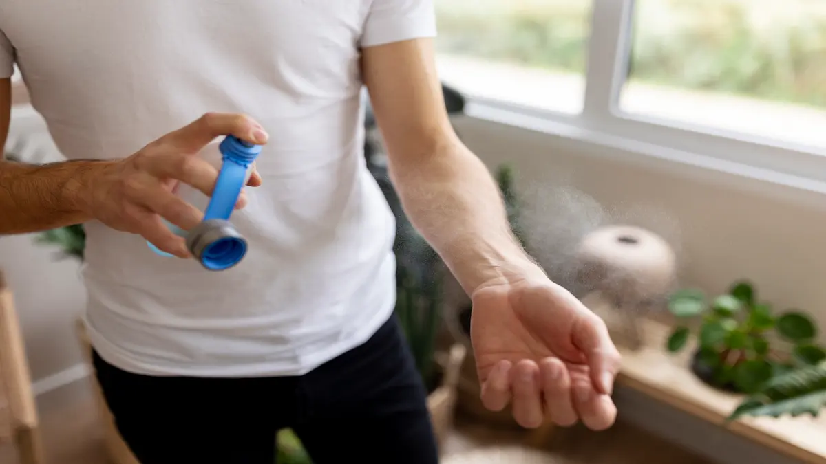 person-putting-mosquito-repellant_Activ Living Community