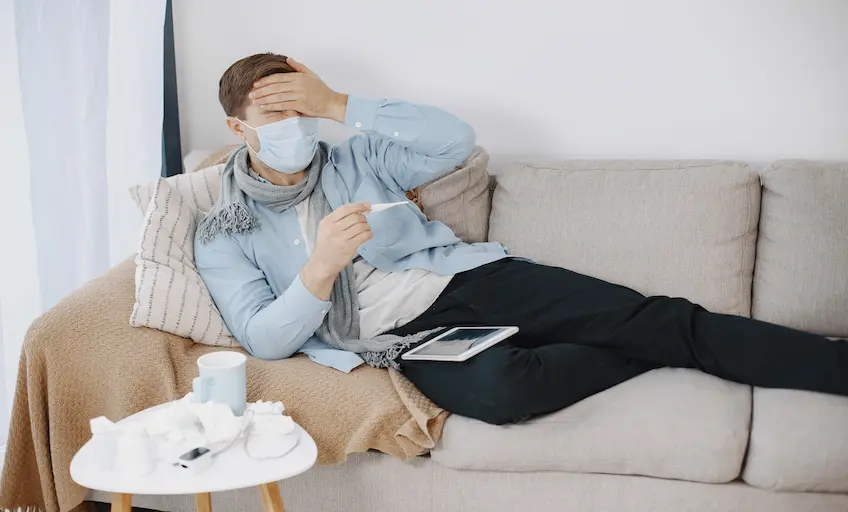 sick-guy-living-room-middle-age-man-feeling-sick-with-cold-fever-home-man-medical-mask_Activ Living Community