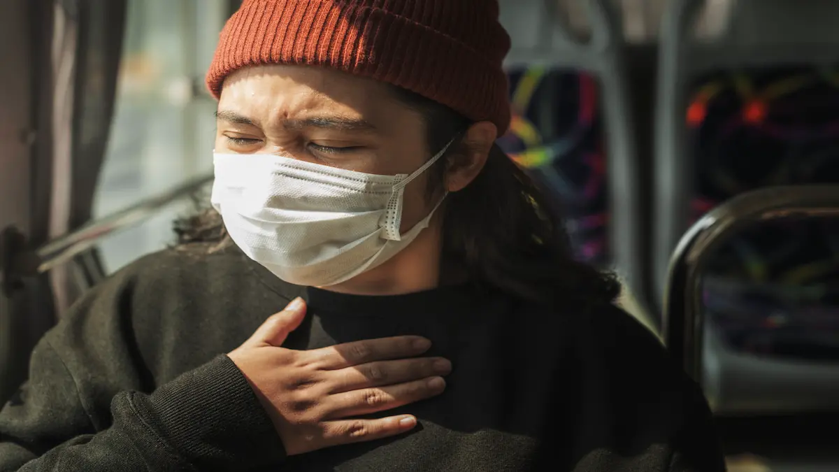 sick-woman-mask-having-difficulty-breathing-coronavirus-pandemic_Activ Living Community
