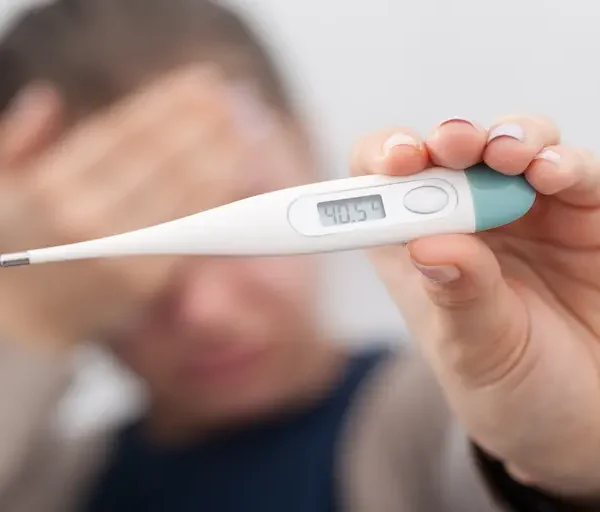 sick-women-with-thermometer_Activ Living Community