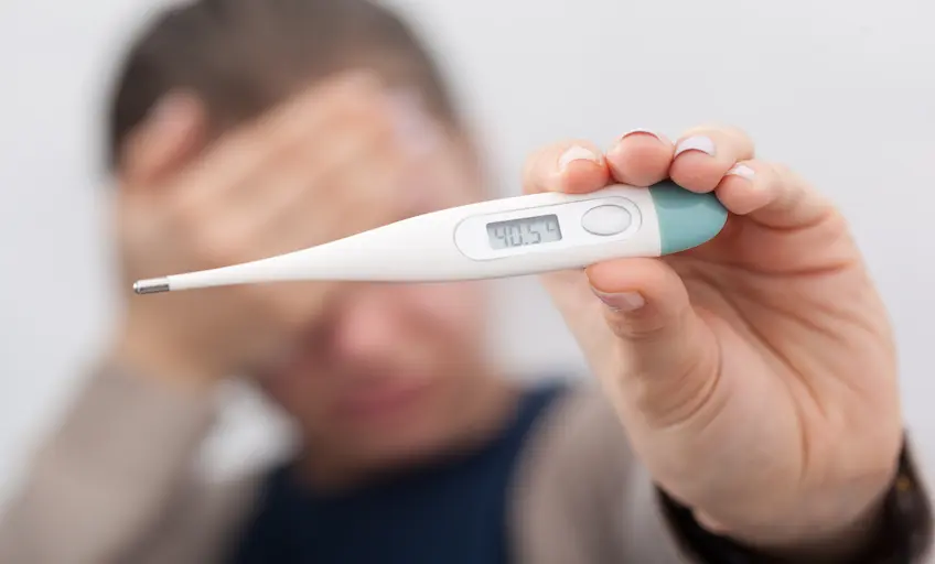 sick-women-with-thermometer_Activ Living Community