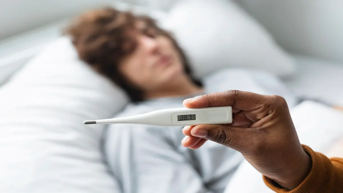 woman-looking-her-friend-s-temperature-thermometer_Activ Living Community
