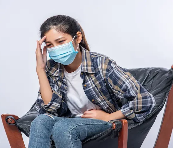 woman-was-sick-sat-chair-touched-her-head-with-her-hand_Activ Living Community