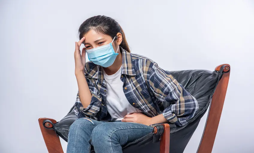 woman-was-sick-sat-chair-touched-her-head-with-her-hand_Activ Living Community