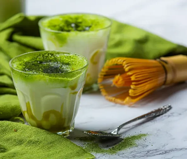 hot-green-tea-glass-with-cream-topped-with-green-tea-decorated-with-green-tea-powder_Activ Living Community