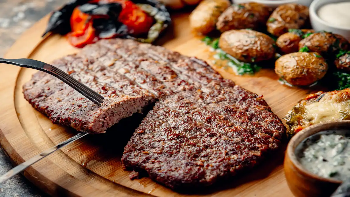 steak-with-fried-potatoes-vegetables-wooden-board_Activ Living Community